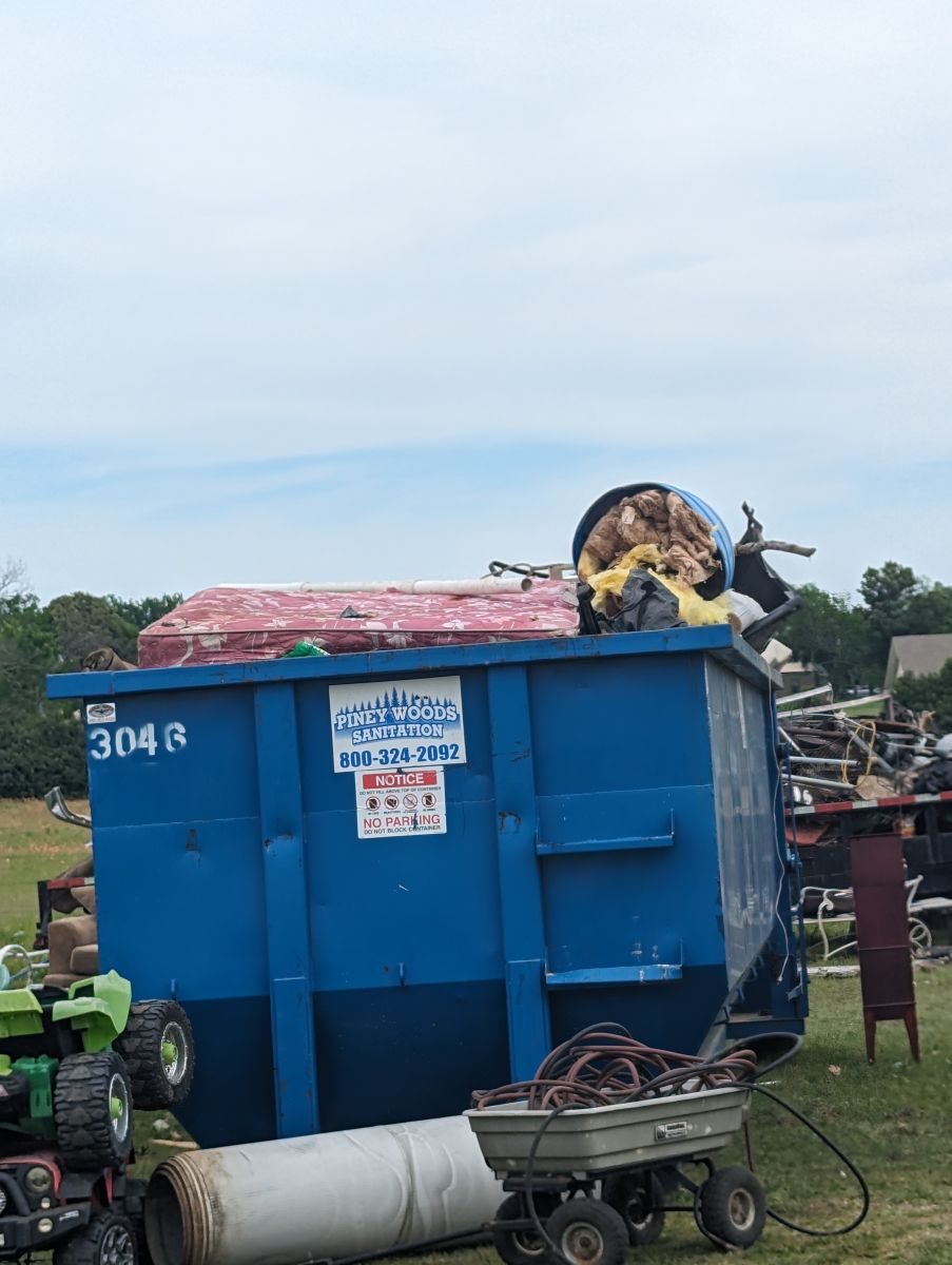 Dumpster full of trash